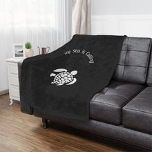 Load image into Gallery viewer, Baby Sea Turtle. The Sea is Calling. White on black. Minky Blanket
